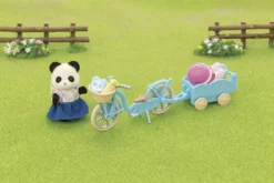 LA FILLE PANDA ET SON VELO AVEC SA REMORQUE - SYLVANIAN VEHICULES