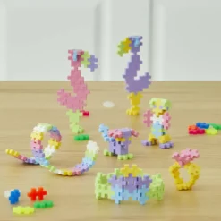 PLUS PLUS - VALISETTE JEU METAL PASTEL ET NEON - 600 PIECES