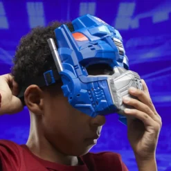 TRANSFORMERS ONE FIGURINE MASQUE 2-EN-1 OPTIMUS PRIME ORION